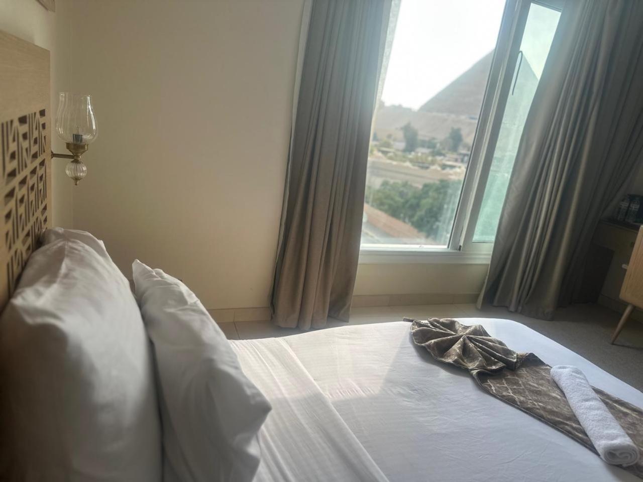Doudou Pyramids View Hotel Kafrat al Jabal Exterior foto
