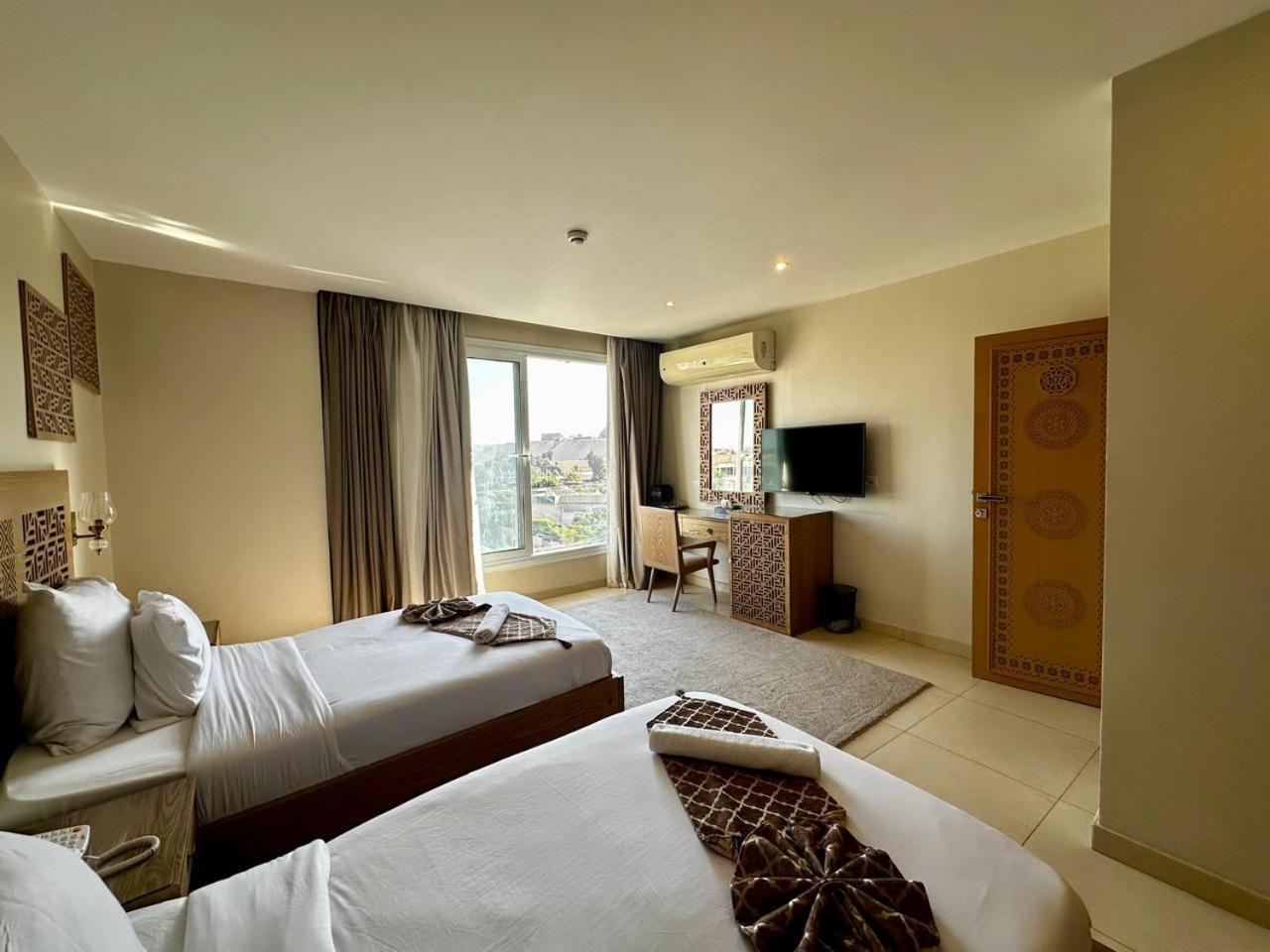 Doudou Pyramids View Hotel Kafrat al Jabal Exterior foto