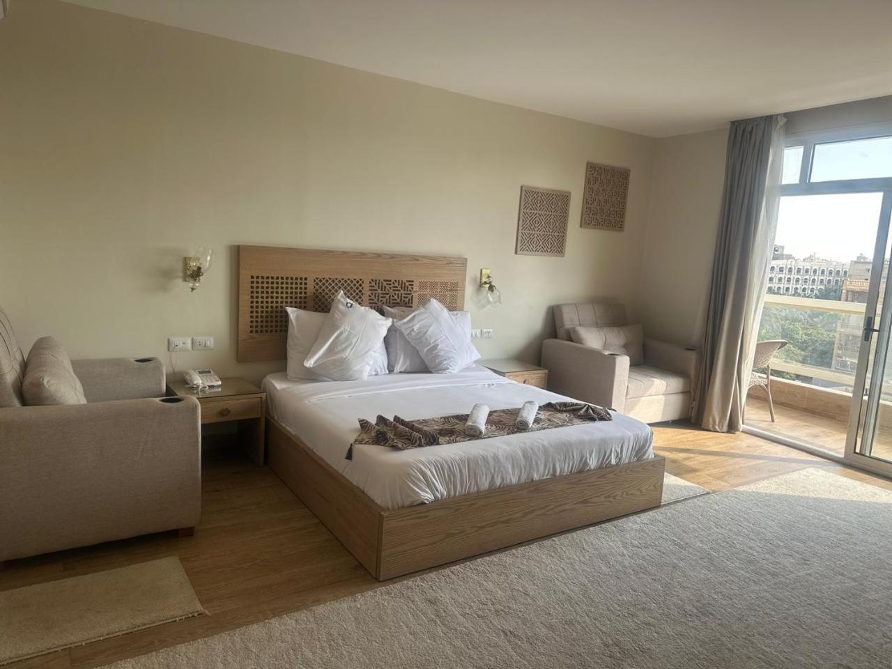 Doudou Pyramids View Hotel Kafrat al Jabal Exterior foto